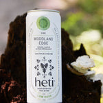 Heti CBD & THC Beverage in flavor Woodland Edge is Cedar, Maple, and Wild Bergamot.