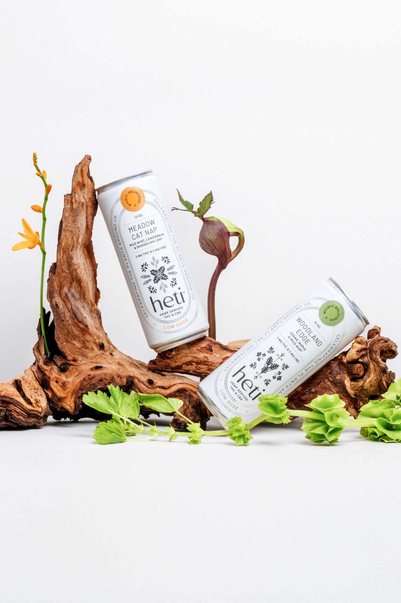 Heti CBD & THC mocktail beverage can in flavor Meadow Cat Nap which is dandelion leaf, lemon balm and wild mint. Flavor Woodland edge is cedar, maple, and bergamot.